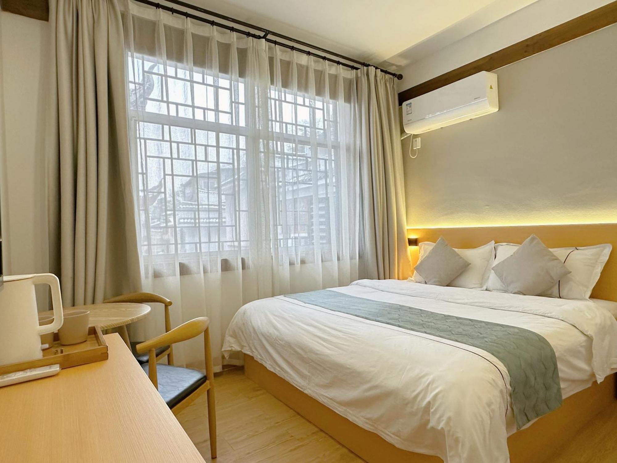 Hemu House Hotell Fenghuang Exteriör bild