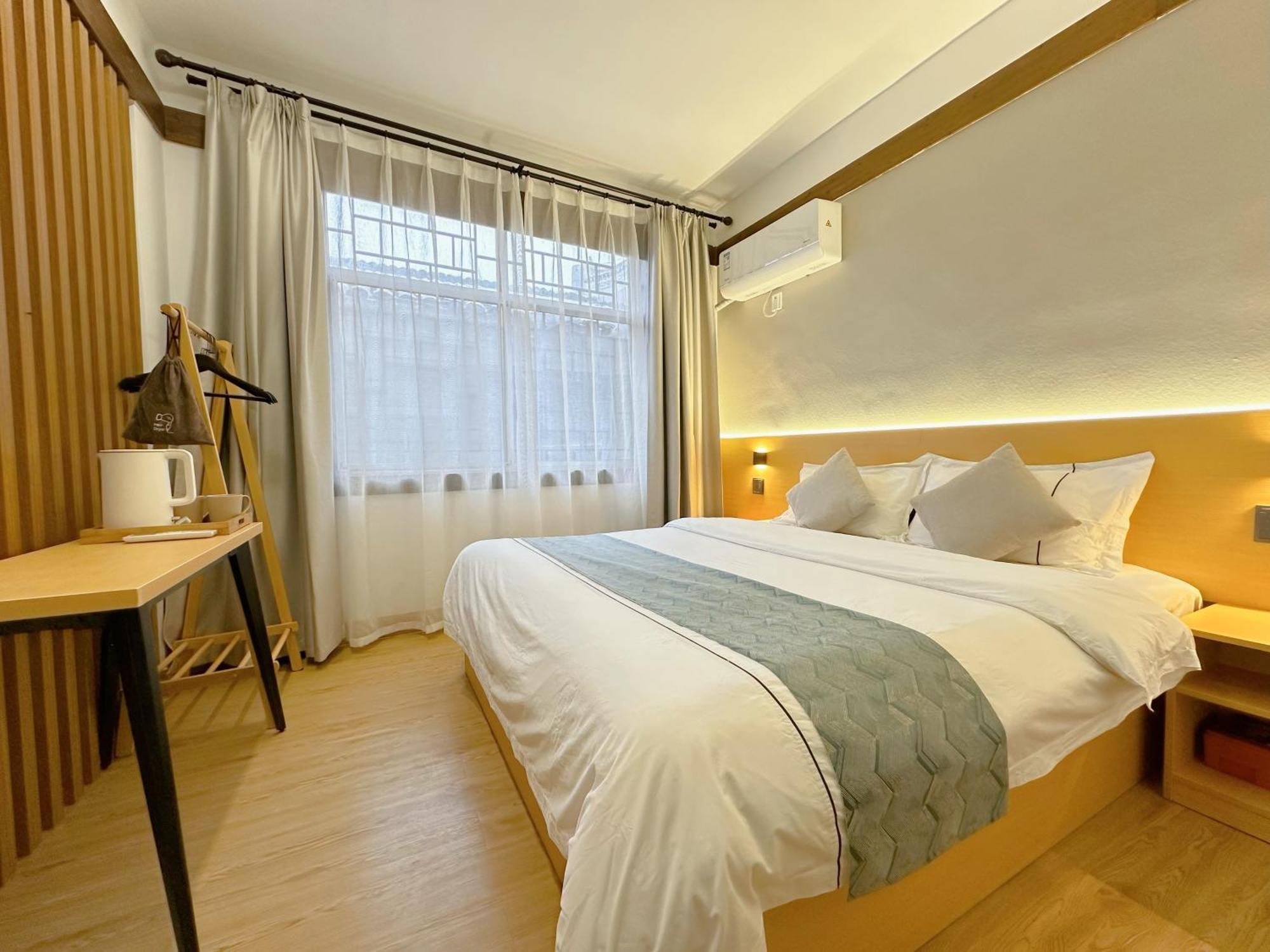 Hemu House Hotell Fenghuang Exteriör bild